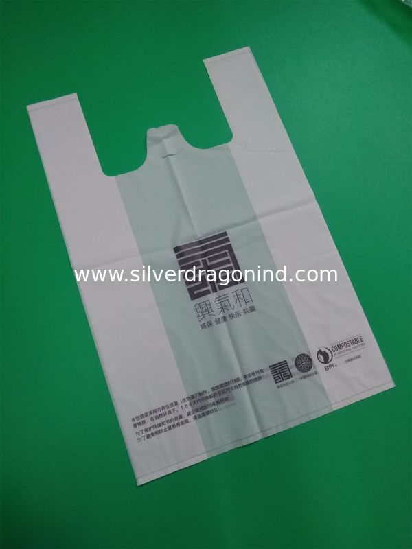 100% biodegradable starch T-shirt bag, 1 color 2 sides printed, size 0.04mm x (30+16)x46cm, withstand 5kg