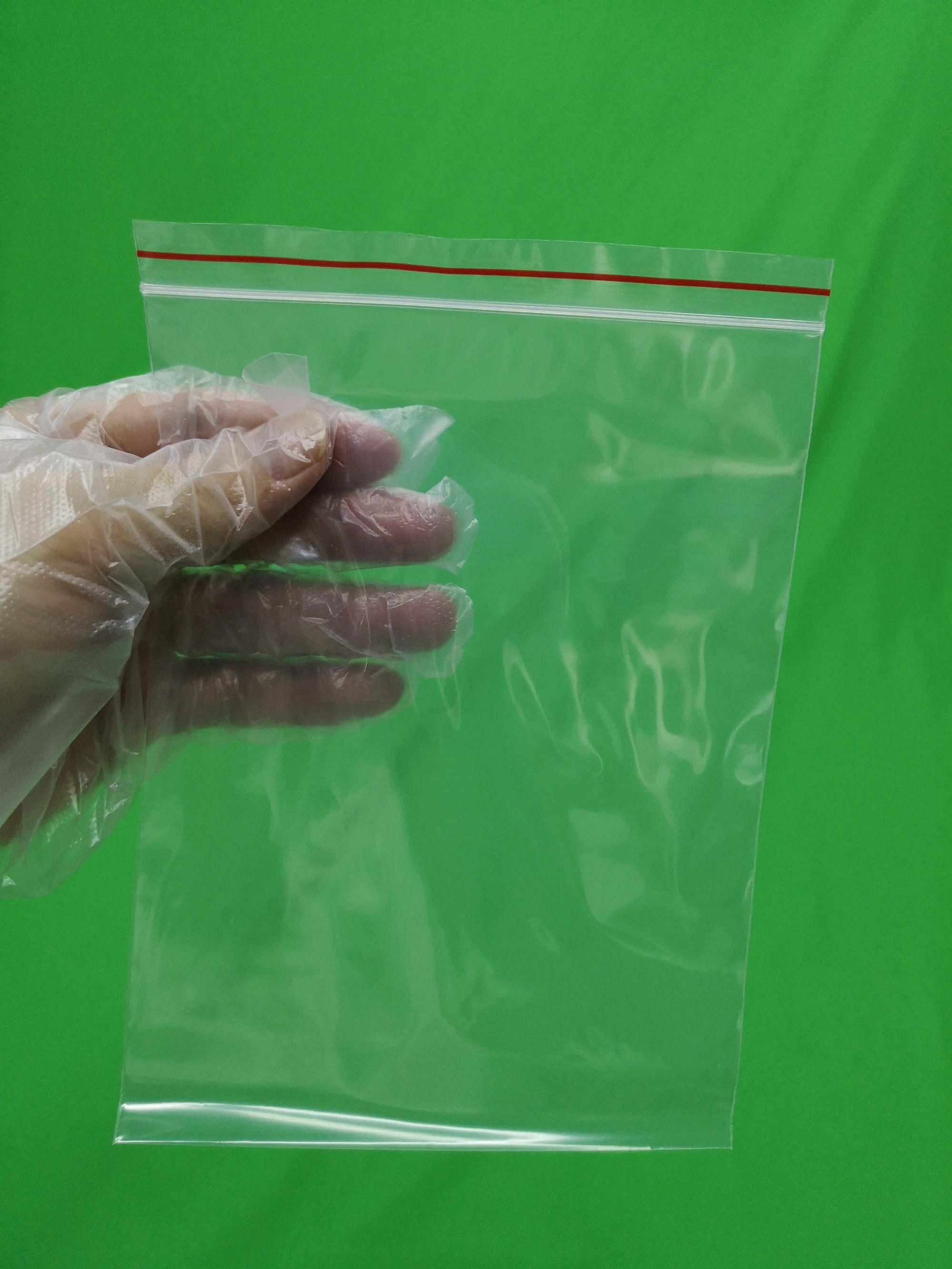 Clear plastic ziplock bag with red line, size 140x200x0.055mm, reclosable