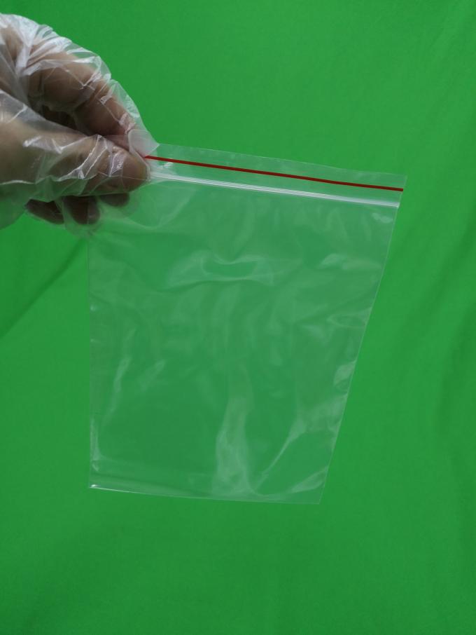 Clear reclosable plastic ziplock bags with red line, size 140x200x0.055mm