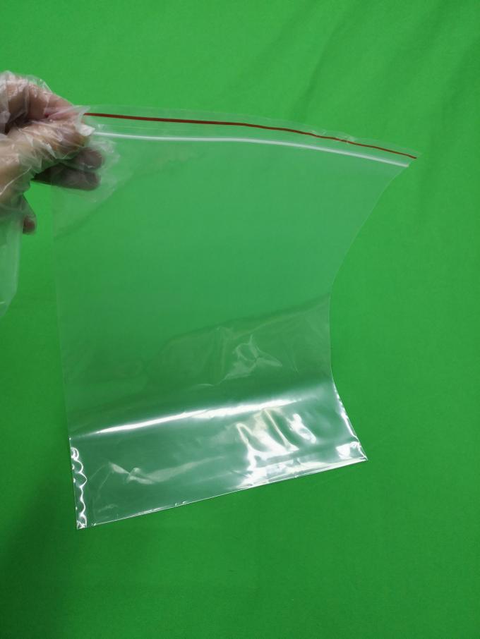 Clear reclosable plastic ziplock bags with red line, size 140x200x0.055mm