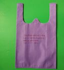 Medium Non woven T-shirt shopping bag in purple color,  30+14x49.5cm,100% virgin, eco-friendly