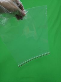 Transparent plastic ziplock bag with red line, size 250x345x0.060mm